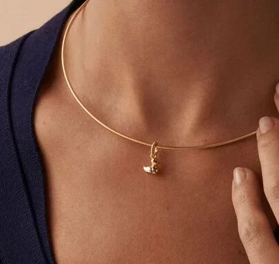 Colgante MAMÁ PATA Dorado / Plateado colección Lucky María Pombo