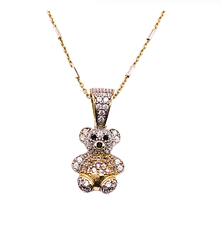 Colgante oso de oro 18K con circonitas bicolor amarilla y blancas y cadena forsada italiana.
