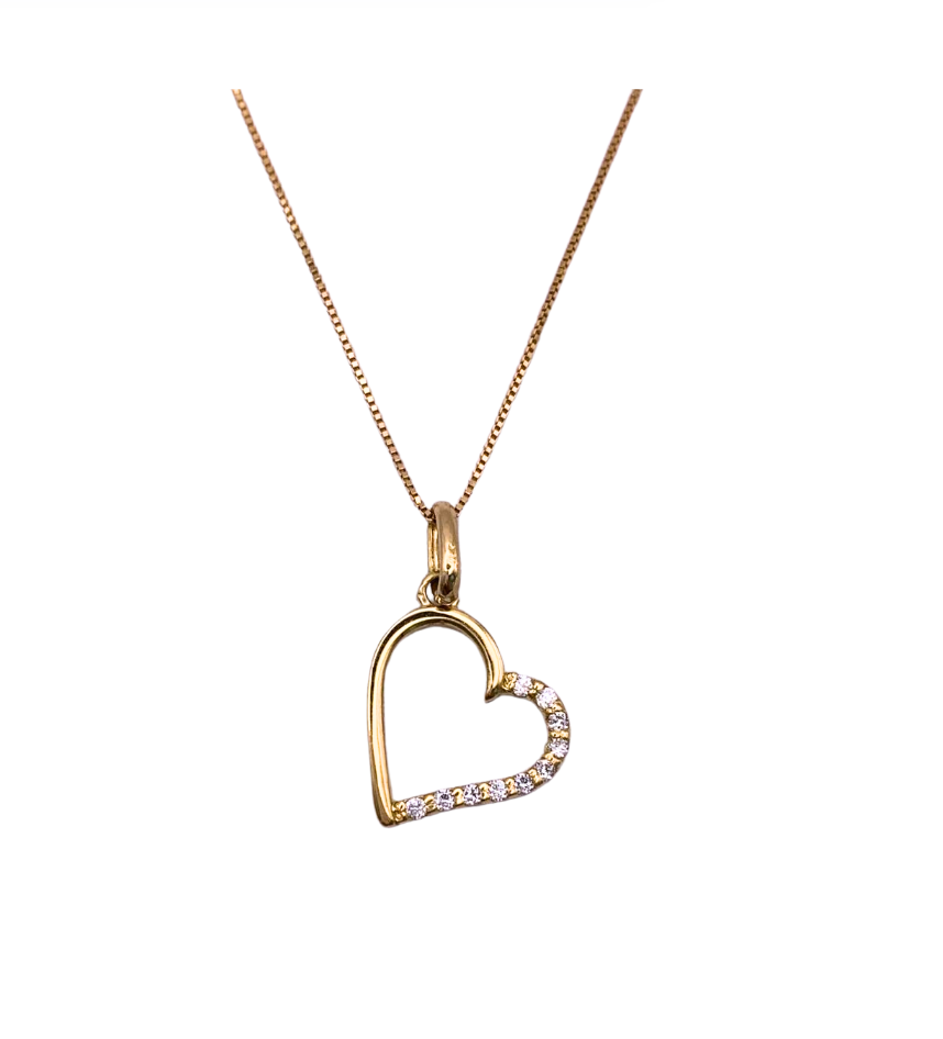 Colgante de corazón de oro 18K con circonitas y cadena de oro 18K forsada con cierre reasa.